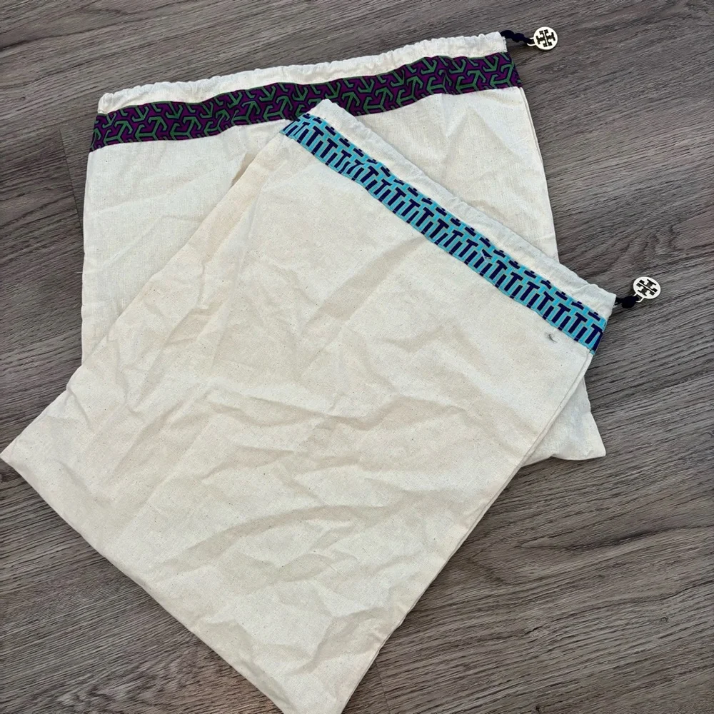 Set of 2 Tory Burch drawstring dust bags, canvas with gold charm